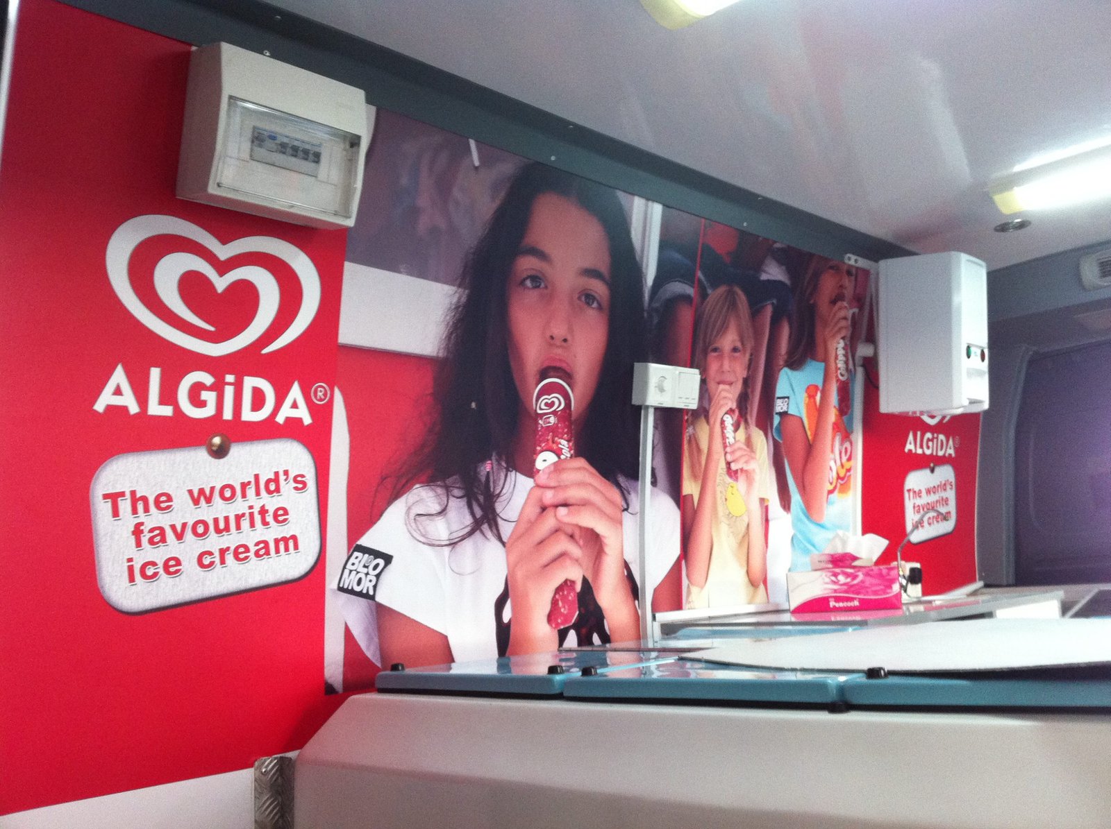 Algida branded interior graphics inside a promotional van